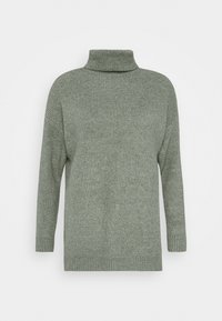 Suéter de cuello alto verde claro, textura de canalé, mangas largas, corte holgado y cuello alto. Diseño básico sin patrones ni acentos visibles.