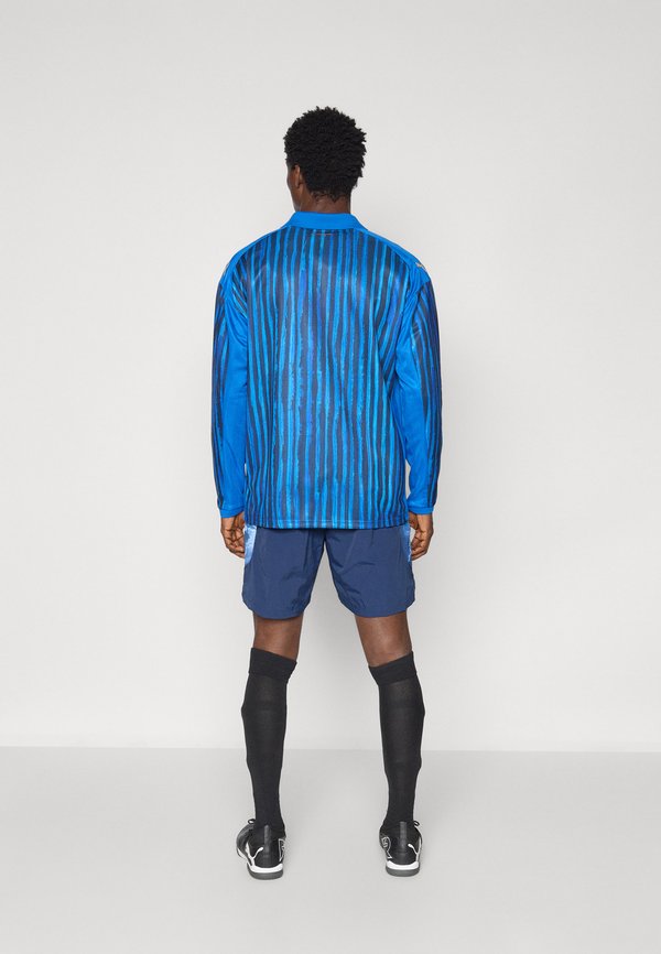 KIDSUPER AL HILAL SFC TRAVEL SHORT - Club wear3