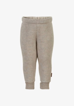 Bézs polár leggings puha textúrával, rugalmas derékrésszel és bordázott szegélyekkel. Az alján, az oldalán egy kis címke található.