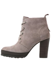 Gray suede ankle boot with a lace-up design, curved toe, and a 4-inch stacked block heel. Features a textured sole for grip.