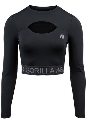 Zwarte cropped longsleeve top met een uitsnijding bij de halslijn, een grijze merkband aan de zoom en een strakke, gladde textuur.