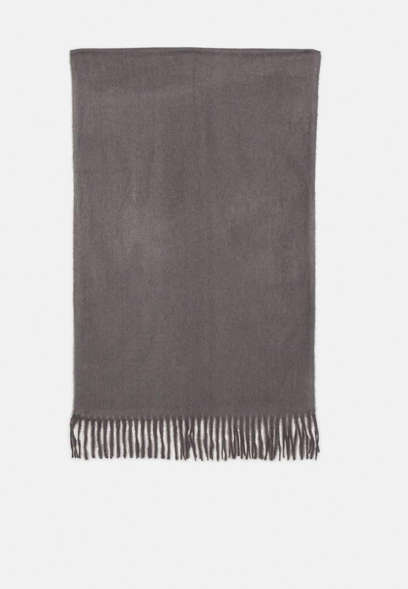 Écharpe grise tissée aux bords frangés, fabriquée en tissu doux, présentant une texture lisse et une forme rectangulaire.