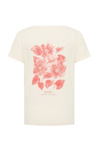 Krēmveida īsām piedurknēm t-krekls ar korallainu ziedu motīvu, kas ietver saulespuķes un lapas, centrēts uz muguras, ar zīmola tekstu zem tā.