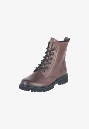 Bruine leren veter enkellaarzen met zwarte zool en zes metalen veterogen aan elke kant.