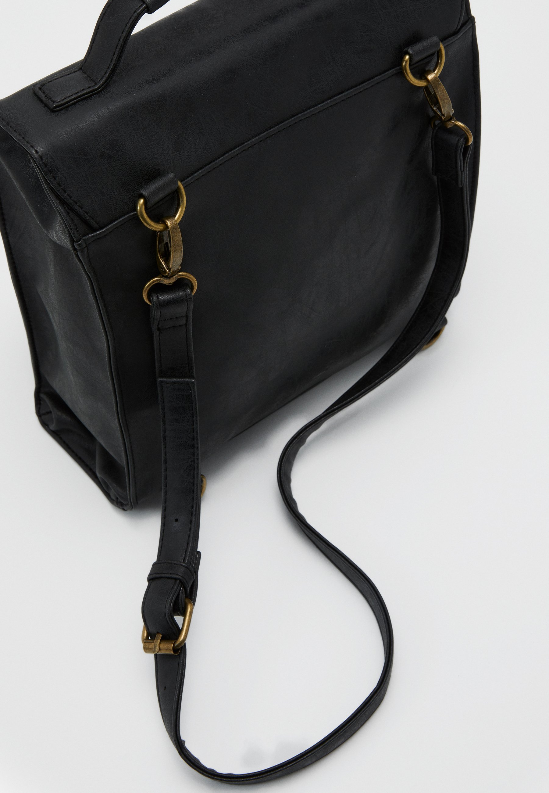 typo buffalo satchel backpack