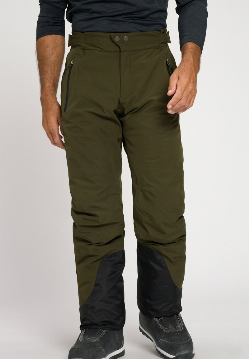 Pantaloni da neve verdi realizzati in materiale impermeabile, dotati di due tasche con cerniera, un accento nero sulla parte inferiore delle gambe e una vita con bottone.