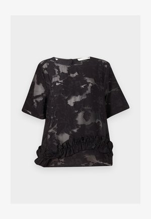Μαύρο ημιδιαφανές μπλουζάκι με φλοράλ ζακάρ σχέδιο, κοντά μανίκια, στρογγυλή λαιμόκοψη και βολάν στο τελείωμα.