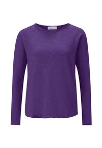 Purple long-sleeve t-shirt made of soft, lightweight fabric. Features a round neck and raglan sleeves with a slightly curved hem.