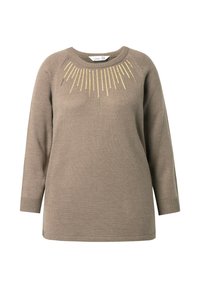 Beżowy sweter z dzianiny z okrągłym dekoltem i długimi rękawami, ozdobiony złotą nicią w wzór promieni słonecznych wokół dekoltu.