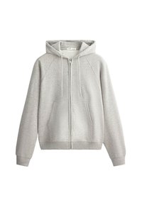 Sweat à capuche zippé gris clair avec poches avant, capuche avec cordon de serrage, poignets et taille côtelés, présenté sur fond blanc.