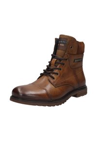 Bruine leren enkellaars met een gladde afwerking, ronde neus, vetersluiting, gevoerd kraagje en logo-details aan de zijkant. Rubberen zool.