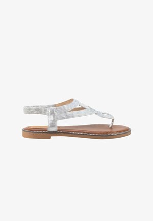 Sandalia plana marrón con tiras de tela plateada y lazo para el dedo, diseñada para uso casual.