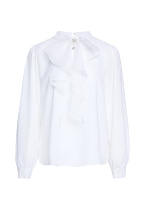 Blusa bianca a maniche lunghe con collo alto, dettaglio arricciato frontale e spilla decorativa sul colletto.