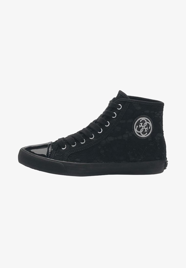 Baskets montantes noires avec laçage à l'avant, semelle en caoutchouc, bout brillant et logo circulaire sur le côté de la cheville.
