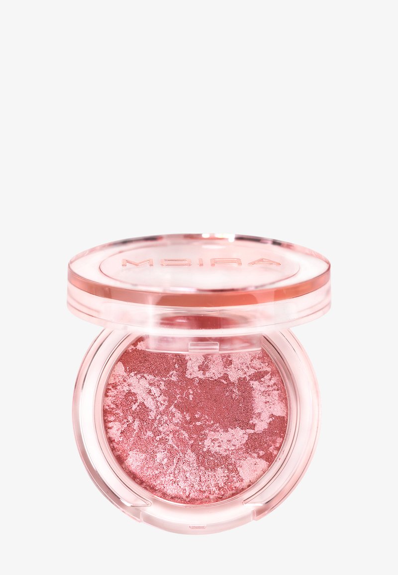 Palette compacte ronde d'ombre à paupières pressée rose scintillante avec couvercle transparent rose portant l'inscription « MOIRA », ouverte sur fond blanc.