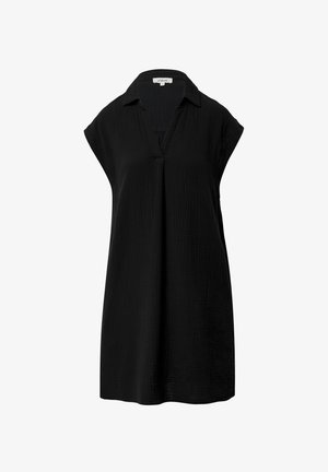 Schwarzes Tunika mit kurzen Ärmeln, strukturiertem Stoff und V-Ausschnitt. Hat eine lockere Passform mit einer dezenten Falte an der Vorderseite.