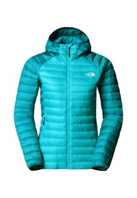 Tealfärgad puffjacka med huva, med quiltad design, hel dragkedja och två sidofickor. Logotypen för märket är på bröstet.