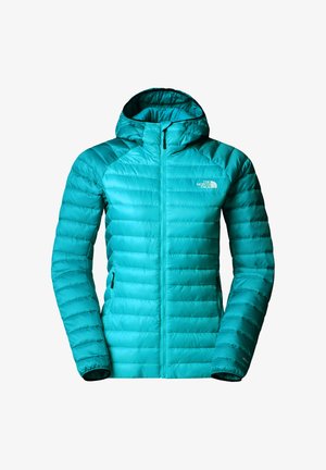 Giacca a vento teal con cappuccio, caratterizzata da un design trapuntato, chiusura a zip completa e due tasche laterali. Il logo del marchio è sulla parte superiore del petto.