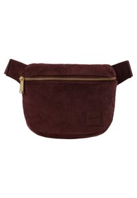 Bordowa nerka z kordurojowego materiału z złotym zamkiem błyskawicznym i regulowanym paskiem, z małą prostokątną naszywką z materiału z przodu.
