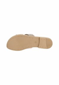 Light brown shoe sole made of rubber with a smooth texture, featuring a rounded shape and subtle ridges for grip.