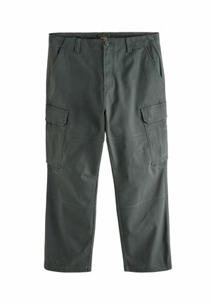 Cargo pants in dark green fabric, featuring multiple side pockets, a relaxed fit, and visible stitching details on the legs.