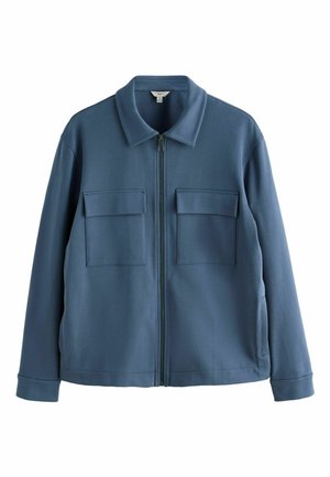 Blue zip-up jacket with long sleeves, two chest flap pockets, side pockets, and a pointed collar.