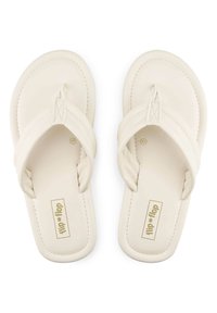 White flip-flop sandals with a smooth matte finish, featuring a thong strap design and subtle stitching. Logo printed on the footbed.