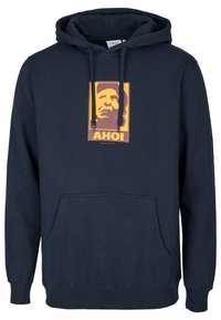 Marineblaue Kapuzenjacke mit Fronttasche, Kordelzugkapuze und einem grafischen Druck, der ein Gesicht und das Wort „AHOI“ in Gelb und Braun zeigt.