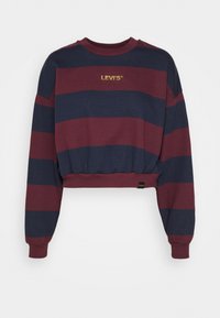 Sweat-shirt court à manches longues avec larges rayures bordeaux et bleu marine, taille élastique et "LEVI'S" en lettres dorées sur la poitrine.