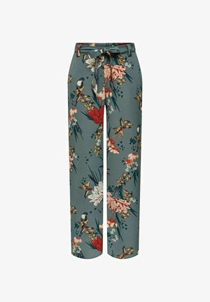 High-waist wide-leg trousers with green base, floral print in red, white, and yellow, and a matching fabric belt tied at the waist.