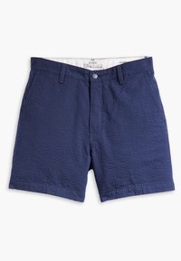 Námořnické modré chino šortky vyrobené z texturovaného materiálu, s knoflíkovým zapínáním, poutky na opasek a předními kapsami. Měkký, lehký materiál.
