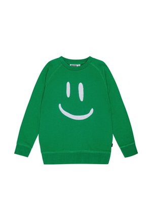 Grüner Sweatshirt mit langen Ärmeln, großem weißem lächelndem Gesicht auf der Vorderseite und rundem Ausschnitt.