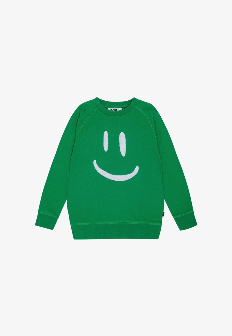 Sweat-shirt vert à manches longues avec un grand design blanc de visage souriant sur le devant et un col rond.