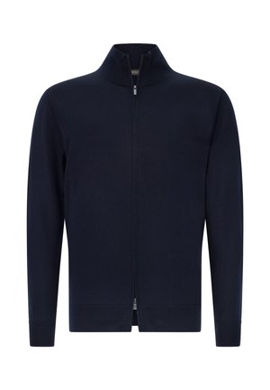 Cárdigan navy con zipper, confeccionado en tela suave, con un cuello alto, mangas largas y puños acanalados para un ajuste ceñido.