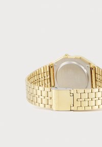Casio UNISEX - Montre à affichage digital - gold-coloured