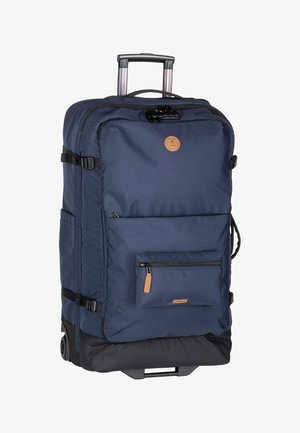 Navy blue rolling duffel bag with a tan leather logo, top handle, retractable handle, and a front zip pocket; fabric material with durable accents.