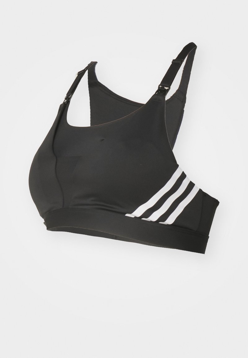 Sujeción deportiva negra con tirantes ajustables, que presenta acentos en tres rayas blancas en el costado. Fabricada con un material liso y elástico.