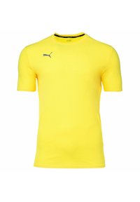 Żółta sportowa koszulka z krótkim rękawem o teksturowanym wykończeniu, z czarnym logo Puma po lewej stronie klatki piersiowej i czarnym kołnierzykiem.