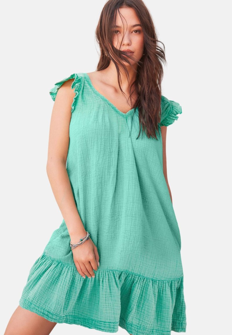 Turquoise korte jurk met gerimpelde mouwen, V-hals en een geplooide zoom. Gemaakt van lichtgewicht, gestructureerde stof.