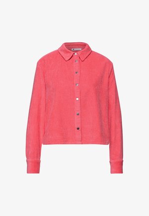 Veste en velours côtelé rose corail à manches longues, col pointu, et boutons-pression argentés sur le devant.