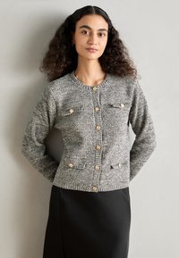 Lindex LUMI - Adīta jaka - black