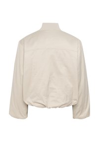 Lichtbeige cropped jack met een geribde kraag, lange mouwen en eenGathered zoom. Glad textuur met een eenvoudig, strak ontwerp.