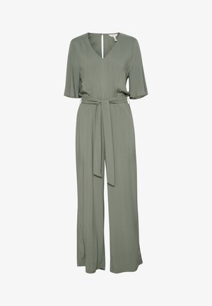 Roheline, lühikeste varrukatega kombinesoon V-kaelusega, volditud tekstuuriga, vöödiga taljes ja laienevate jalgadega. Sisaldab tagumist tõmblukk. Kerge kangas.