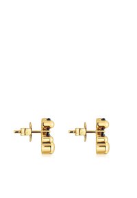 Pendientes de estudiar en tono dorado con un diseño redondeado, acentos negros y un cierre seguro en la parte posterior. Textura suave con acabado pulido.
