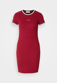 Red cotton t-shirt dress with short sleeves, white and black ribbed collar and sleeve edges, featuring a central logo above the hem.