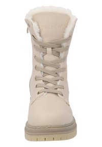 Botte beige à lacets en cuir lisse avec doublure en fausse fourrure, matériel doré, semelle robuste et détail de couture renforcé.