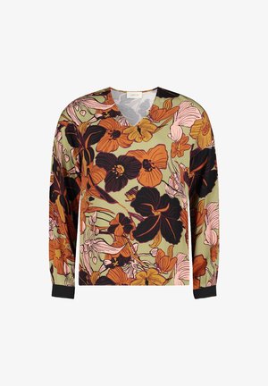 Lekka bluzka we wzór kwiatowy z dekoltem w serek, z pomarańczowymi, czarnymi i różowymi kwiatami na jasnobeżowym tle. Długie rękawy i czarne mankiety.