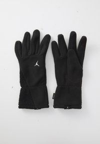 Sorte fleece vinterhandsker med hvide Jumpman-logoer, teksturerede håndledsmanchetter og finger, der er kompatibel med touchskærme på højre handske.