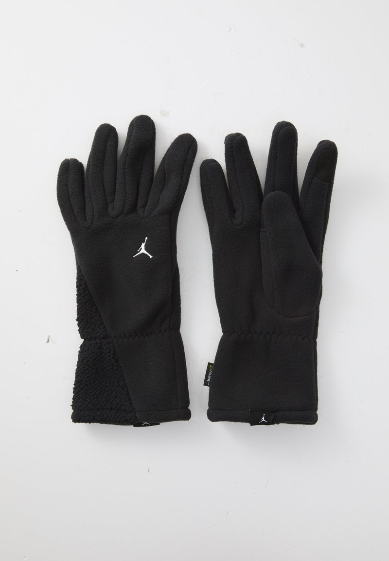 Sorte fleece vinterhandsker med hvide Jumpman-logoer, teksturerede håndledsmanchetter og finger, der er kompatibel med touchskærme på højre handske.