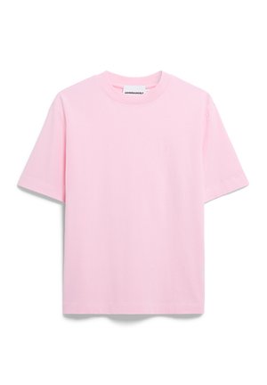 T-shirt di cotone rosa chiaro con scollatura rotonda e maniche corte. Presenta un piccolo logo ricamato sul petto. Vestibilità semplice e rilassata.